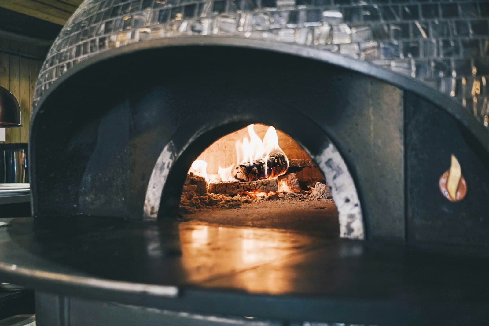 The wood-fired oven at service